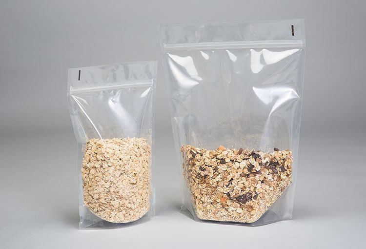 Průhledné stojací doypack sáčky se zipem naplněné muesli